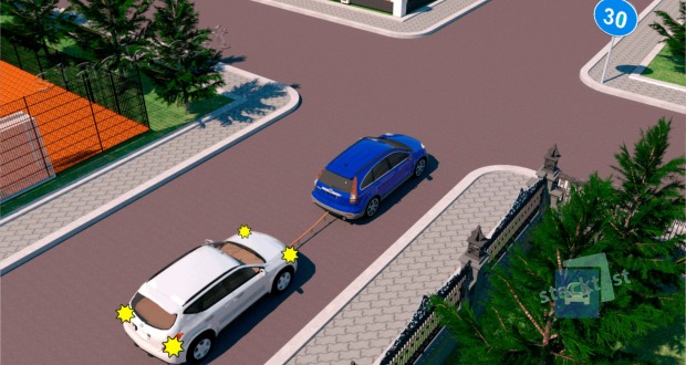 Vai velkoša viegla automobiļa vadītajam atļauts pārbraukt krustojumu taisnā virzienā?